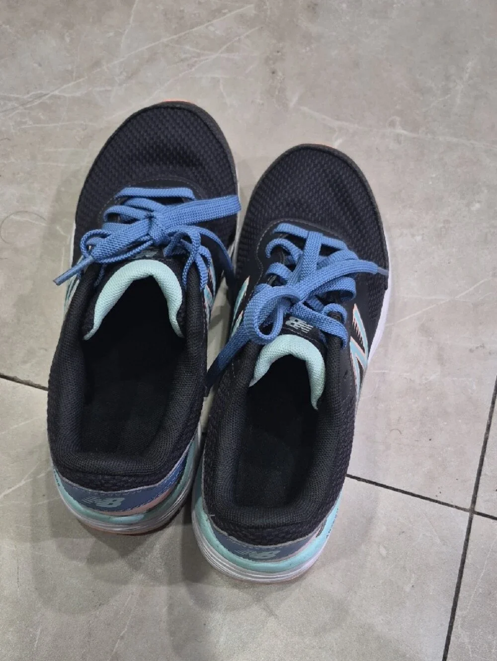 New Balance Women's Black Athletic Sneakers with Blue Laces and Peach Accents